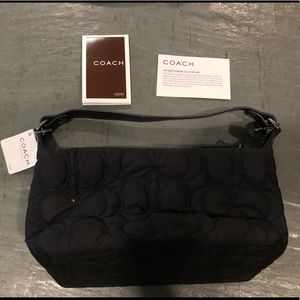 NWT black The Coach signature collection bag